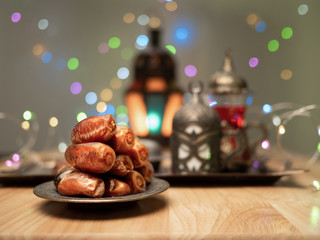 close up shot on dates, sweet dried fruits on wooden background,