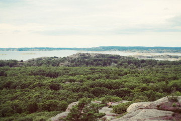 Fototapeta na wymiar Dramatic view over Swedish landscape in Hjälteby, Götaland, Sweden
