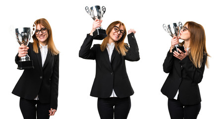 Set of Young business woman holding a trophy
