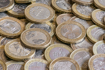 Closeup Pile of Collectable Commemorative British Two Pound £2 Coins
