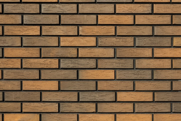 Brick wall, bricks of different colors