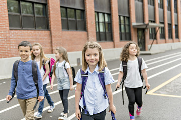 Obraz premium A Group of students outside at school standing together