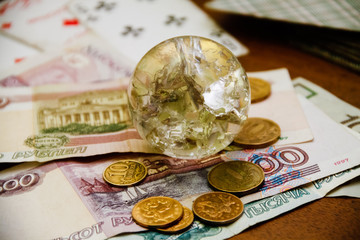 Money and a transparent ball