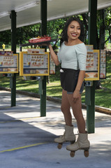 Woman food service worker server or waitress on roller skates