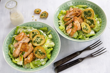 Caesar salad with salmon and herb croutons 