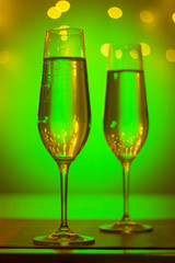 Champagne glasses in disco party bar