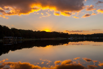 Sunrise Across a Still Lake