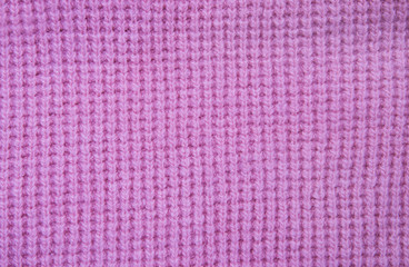 Pink knitted fabric background texture