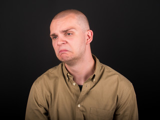 Obraz premium Young man is sad