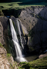 Obraz premium Speke's Mill Mouth Waterfall near Hartland Quay in North Devon