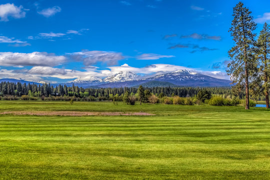 Three Sisters Mountains across the field at Black Butte 