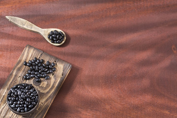 Raw black beans. Top view - Phaseolus vulgaris' Black turtle