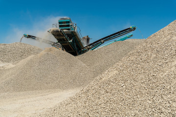 Machine working in the stone mine