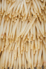 fresh white asparagus decorated at the weekly market, can be used as background - obrazy, fototapety, plakaty