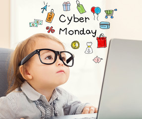 Cyber Monday text with toddler girl using her laptop