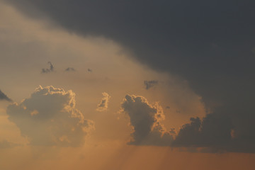 Fototapeta na wymiar Overcast sky with clouds and gleams