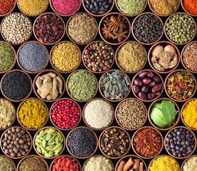 Spices and herbs isolated on black background. Various spices for food