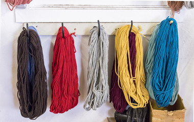 Yarn used used for weaving Southwestern Native American blankets on a loom. Town of Chimayó, along...