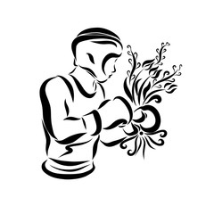 Young boxer in a helmet with a bouquet of flowers