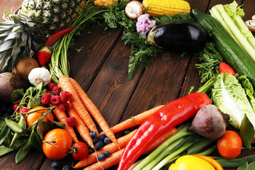 Composition with variety of raw organic vegetables and fruits. Balanced diet