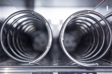 Horizontal View of Close Up of Empty Spirals inside the Snack Vending Machine