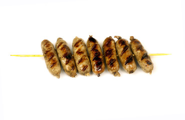 sausages pork grill on skewer to beer