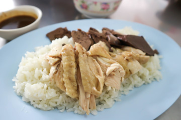 chicken rice or rice topped with chicken