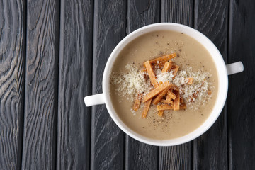 Top view of mushroom soup puree with chips