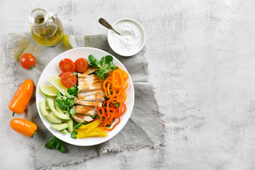 Vegetable salad with grilled chicken breast