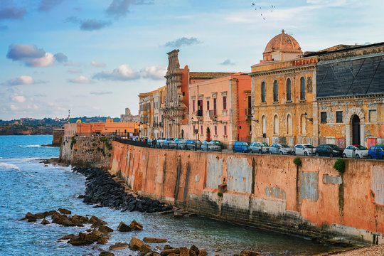 Embankment at old city in Siracusa and Mediterranean sea Sicily
