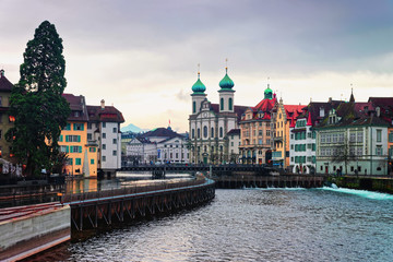 Fototapeta premium Jesuit Church along the river Reuss Switzerland