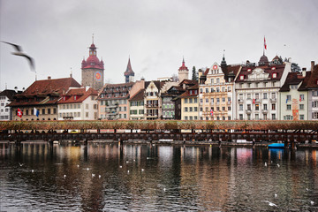 Fototapeta premium Reuss riverbank in old town of Lucerne Switzerland