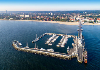 Sopot resort in Poland. Wooden pier (molo) with marina, yachts, pirate tourist ship, beach,...