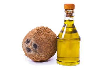 coconut and coconut oil isolated on white
