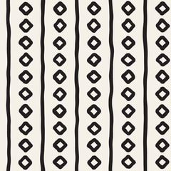 Obraz premium Hand drawn style ethnic seamless pattern. Abstract grungy geometric background in black and white.