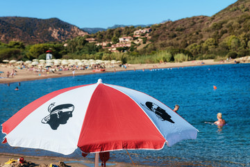Umbrella in Chia beach in Mediterranian Sea
