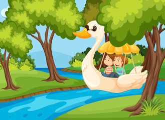 Obraz na płótnie Canvas A Couple Riding Swan Boat