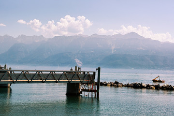 Pier at Lake Geneva promenade summer Lausanne