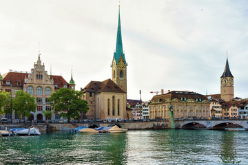 Fraumunster Church and Saint Peter boats at Limmat Zurich