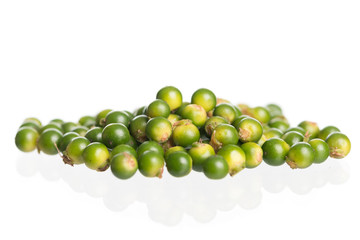 Fresh black pepper on white background