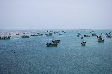Obraz premium Fishing Boats on Blue Ocean