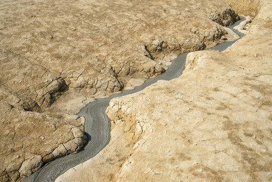dried ditches of water on arid landscape, natural disaster drought global warming concept 