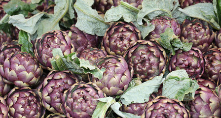 artichokes with leaves for sale in the fruit and vegetable marke
