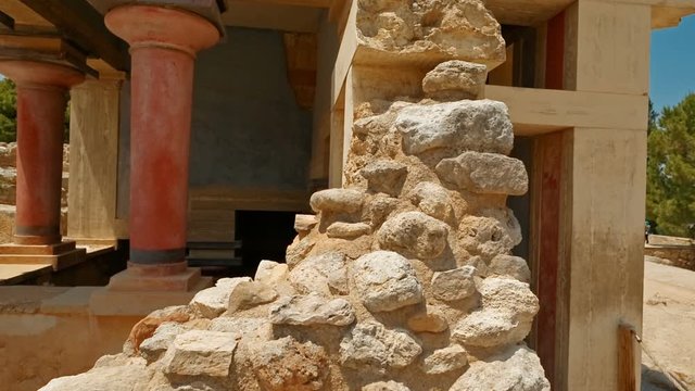 Tracking shot of a temple within the complex of the Minoan Palace of Knossos, Heraklion, Crete, Greece. Knossos is the largest Bronze Age archaeological site in Crete and Europe's oldest city.