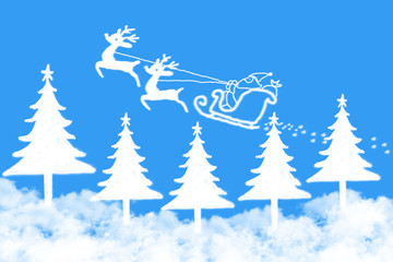 Clouds shaped Santa Claus driving in a sledge on blue sky