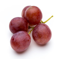 Ripe red grape isolated on white.