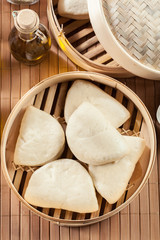 Fototapeta na wymiar Gua bao, steamed buns in bamboo steamer