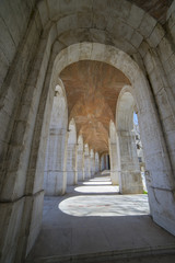 Passage Old arcs, architecture. A sight of the palace of Aranjuez (a museum nowadays), monument of the 18th century, royal residence Spain.