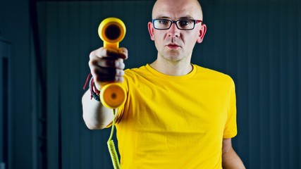 Young man in yellow tshirt