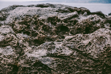 Volcanic Rock Shore at Jusangjeolli. Jeju Island, South Korea. The Jusangjeolli (columnar jointing) cliff is a spectacular volcanic rock formation at the southern coast of Jeju Island.